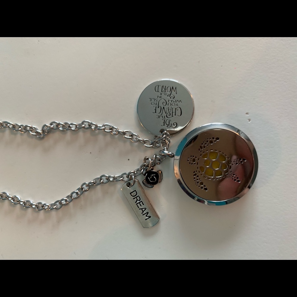 Essential oil diffusing necklace